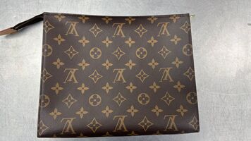 Louis Vuitton Toiletry Pouch showcased in signature Monogram canvas.