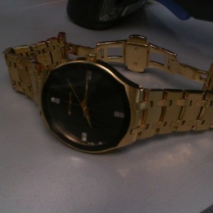 WITTNAUER WOMEN’S QUARTZ BLACK DIAL WATCH